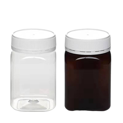 Dos frascos plásticos livres do alimento 320ml de BPA quadrado mal ventilado Honey Bottle With Lid