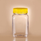 Dos frascos plásticos livres do alimento 320ml de BPA quadrado mal ventilado Honey Bottle With Lid